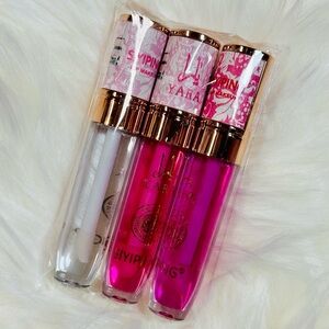 Pink, purple and Clear Lip Gloss trio